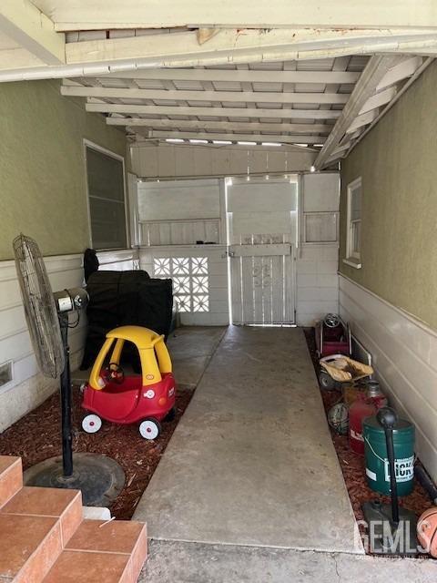 2320 Olympic Dr, Bakersfield, CA 93308 - garage featuring wainscoting