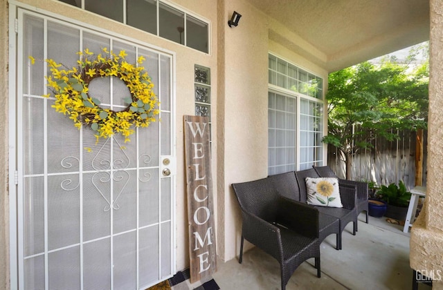 8315 Persimmon Dr, Bakersfield, CA 93311 - view of exterior entry featuring covered porch and stucco siding