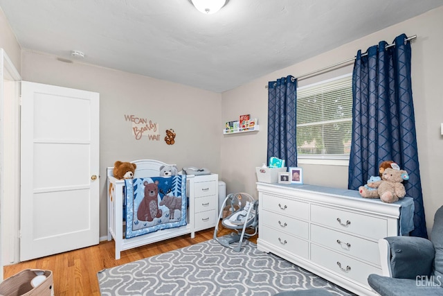 324 Western Dr, Bakersfield, CA 93309 - bedroom with wood finished floors