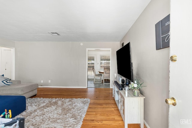 324 Western Dr, Bakersfield, CA 93309 - living room featuring light wood-type flooring and baseboards