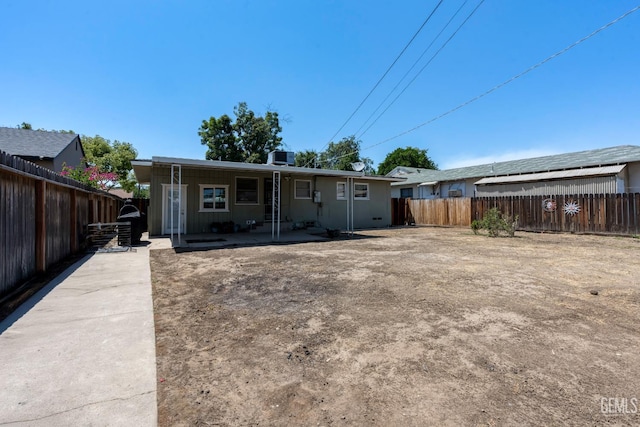 324 Western Dr, Bakersfield, CA 93309 - rear view of property with a fenced backyard