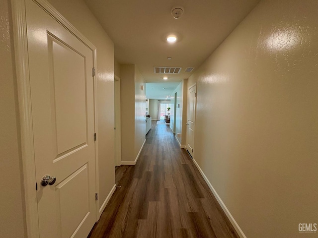 7303 Sepulveda Ct, Bakersfield, CA 93313 - hall with dark wood finished floors and baseboards