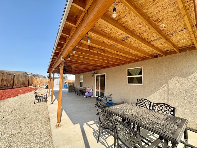 7303 Sepulveda Ct, Bakersfield, CA 93313 - fenced backyard featuring outdoor dining area and a patio