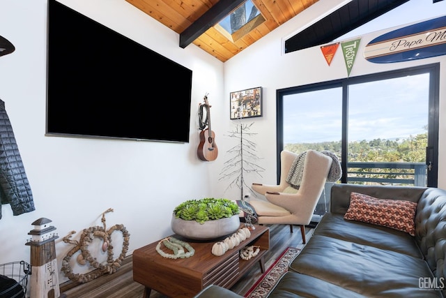 living room with hardwood / wood-style flooring, lofted ceiling with skylight, and wood ceiling