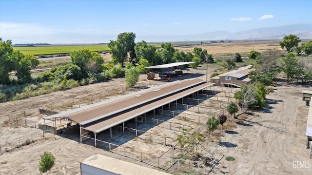 8661 Herring Rd, Bakersfield, CA 93313 - exterior space with a view of countryside, an exterior structure, a mountain view, and an outbuilding