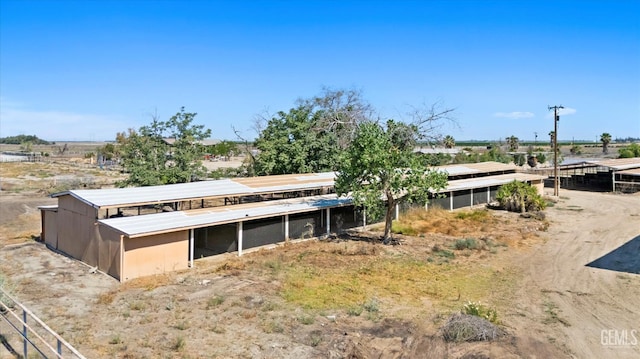 8661 Herring Rd, Bakersfield, CA 93313 - view of front of home with an outbuilding and an exterior structure