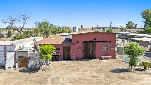 8661 Herring Rd, Bakersfield, CA 93313 - view of front of home with stucco siding