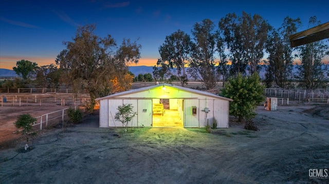 8661 Herring Rd, Bakersfield, CA 93313 - view of outdoor structure at dusk