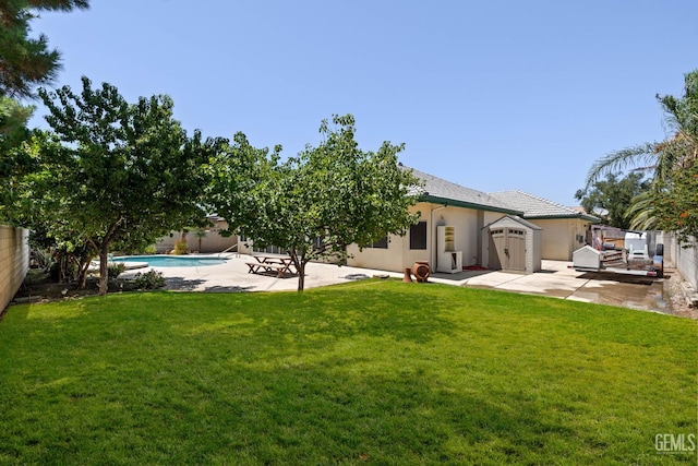 4207 Crystal Lake Dr, Bakersfield, CA 93313 - back of property with a patio area, a fenced backyard, and stucco siding