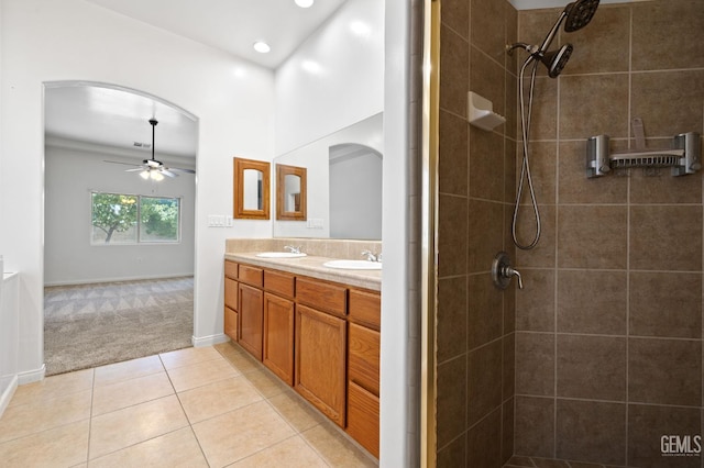 4207 Crystal Lake Dr, Bakersfield, CA 93313 - full bathroom with double vanity, a tile shower, ceiling fan, tile patterned flooring, and recessed lighting