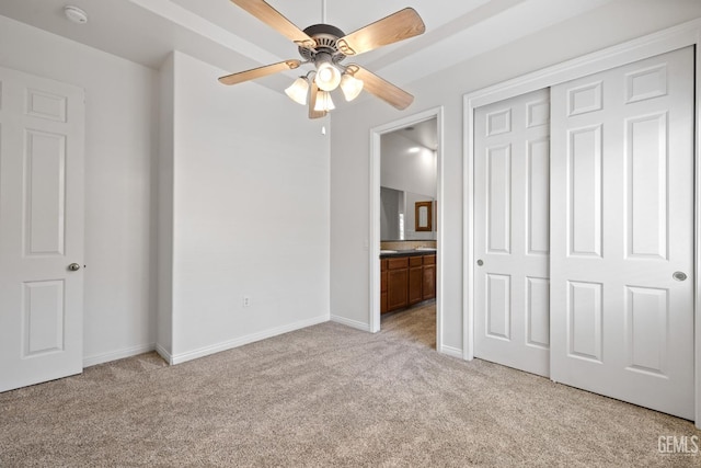 4207 Crystal Lake Dr, Bakersfield, CA 93313 - unfurnished bedroom featuring light carpet, ensuite bath, a closet, and ceiling fan