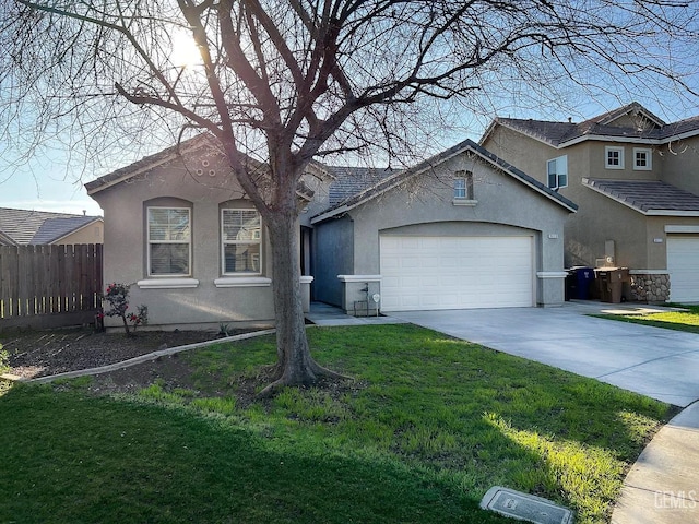 5413 Ridgecrest Ct, Bakersfield, CA 93313 - view of front of property featuring stucco siding, a garage, and driveway