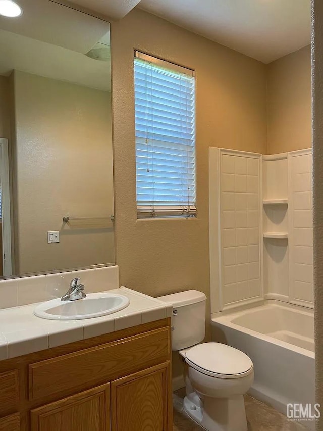 5413 Ridgecrest Ct, Bakersfield, CA 93313 - bathroom featuring vanity, tile patterned floors, and washtub / shower combination