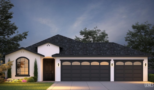 view of front facade featuring an attached garage, stucco siding, concrete driveway, and roof with shingles