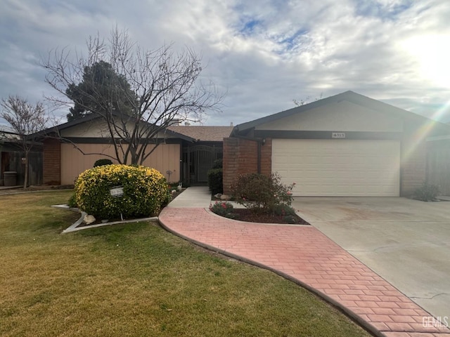 ranch-style house with a front lawn and a garage