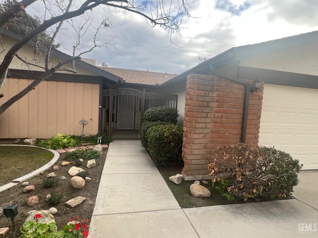 view of side of property featuring a garage