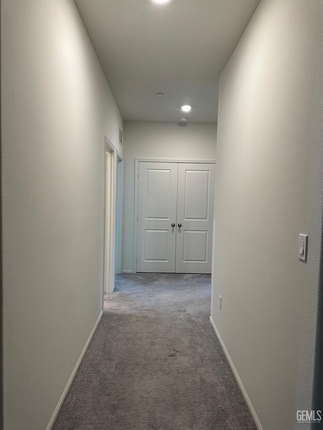 7410 Koyuk River St, Bakersfield, CA 93311 - corridor with carpet and baseboards