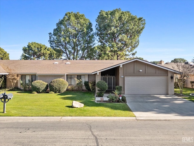 ranch-style home with a garage and a front lawn