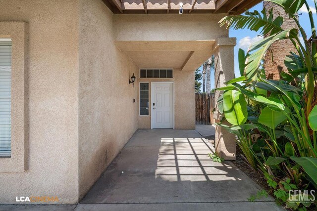 3502 Southpass Dr, Bakersfield, CA 93312 - property entrance with stucco siding and a patio