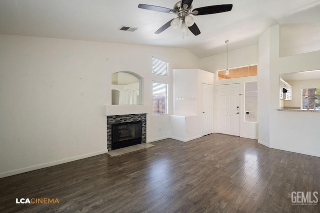 3502 Southpass Dr, Bakersfield, CA 93312 - unfurnished living room with healthy amount of natural light, wood finished floors, a ceiling fan, a fireplace with flush hearth, and high vaulted ceiling