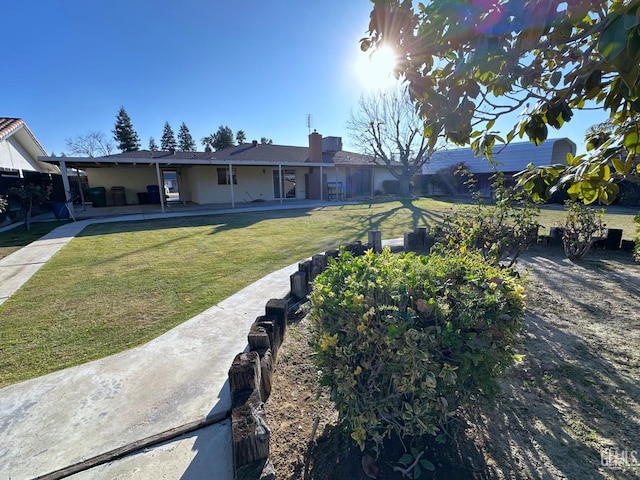 exterior space featuring a front yard