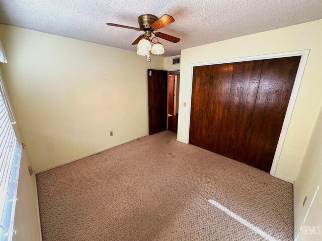 full bathroom featuring toilet, vanity, tile patterned flooring, and plenty of natural light