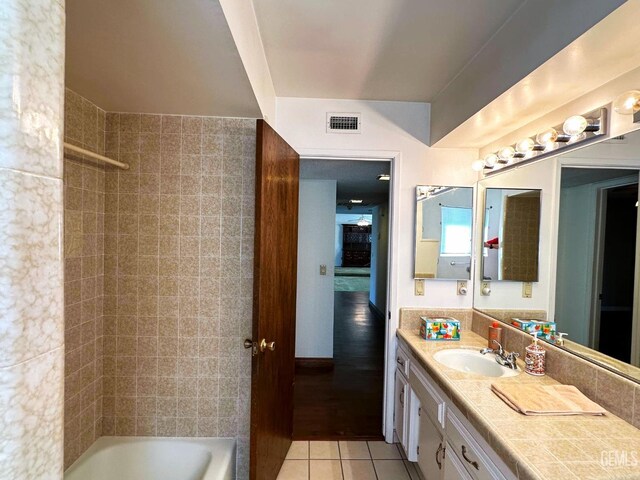 bathroom with vanity and tile patterned floors