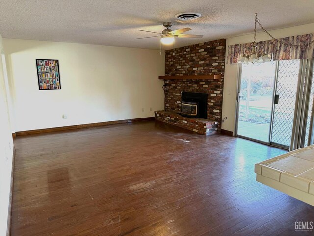 entryway with carpet floors and a textured ceiling