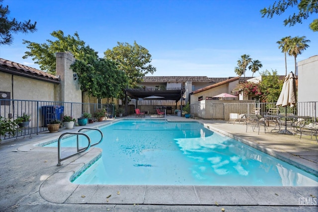 view of pool featuring a patio area