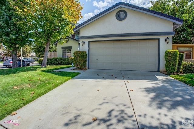 ranch-style home featuring a front lawn and a garage