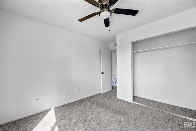 unfurnished bedroom featuring a textured ceiling, a ceiling fan, baseboards, a closet, and carpet