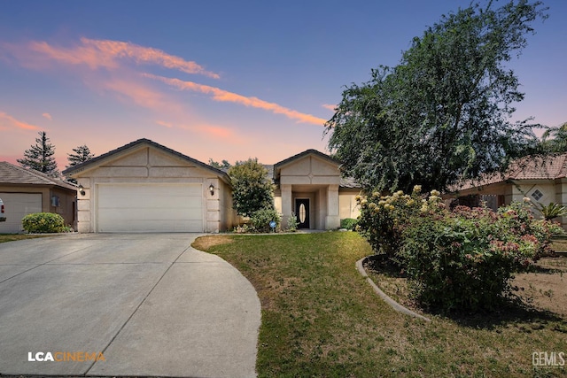 10707 Mohican Dr, Bakersfield, CA 93312 - view of front of house with a front lawn, concrete driveway, a garage, and stucco siding