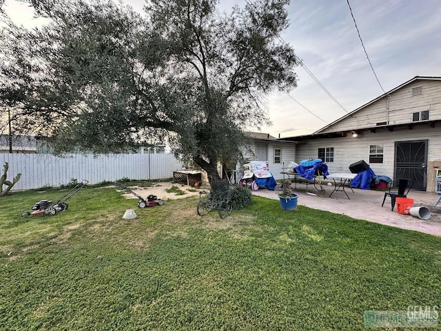 view of yard with a patio area and fence