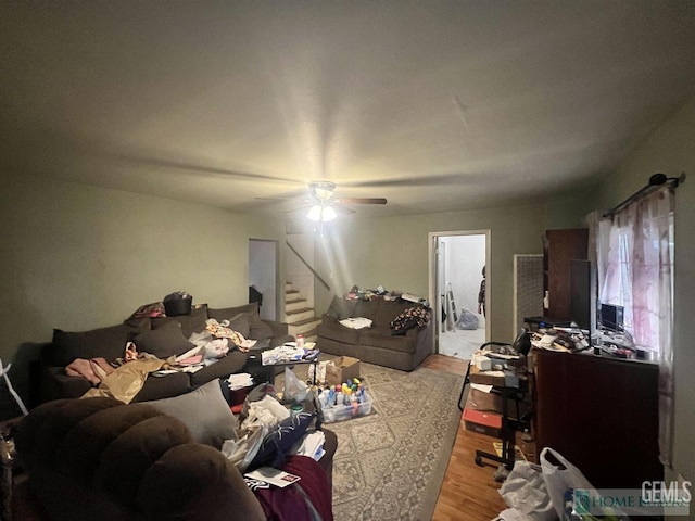 bedroom with ceiling fan and light wood finished floors