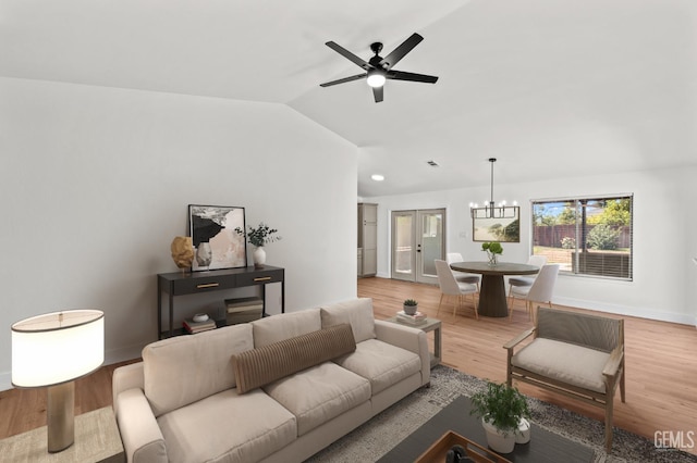 6201 Regina Way, Bakersfield, CA 93307 - living room with lofted ceiling, a chandelier, wood finished floors, ceiling fan, and baseboards