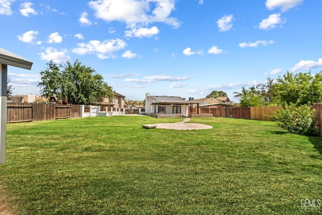 6201 Regina Way, Bakersfield, CA 93307 - view of yard featuring a patio area