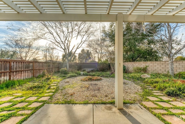 view of yard featuring a pergola and a patio