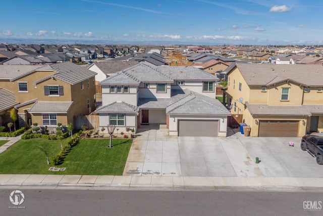 7327 Glitter Way, Bakersfield, CA 93313 - view of front facade featuring a residential view, stucco siding, concrete driveway, and a tiled roof