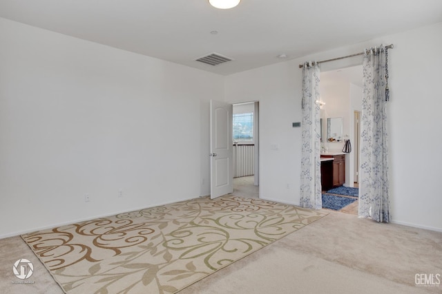 7327 Glitter Way, Bakersfield, CA 93313 - empty room with light colored carpet and baseboards