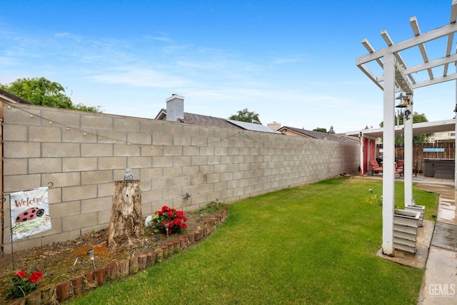 view of yard with a fenced backyard and a pergola