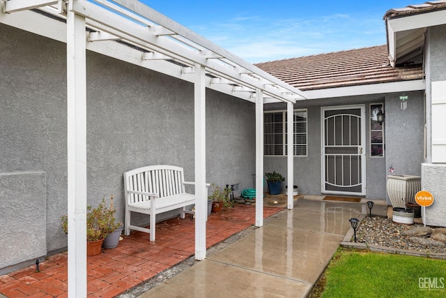 view of patio / terrace featuring a pergola