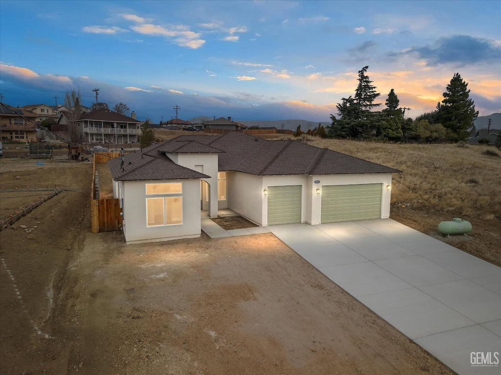 view of front of home with a garage