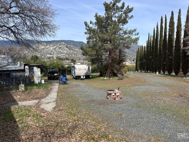 2000 Old Canal Rd, Lake Isabella, CA 93240 - view of side of property with stucco siding and a mountain view