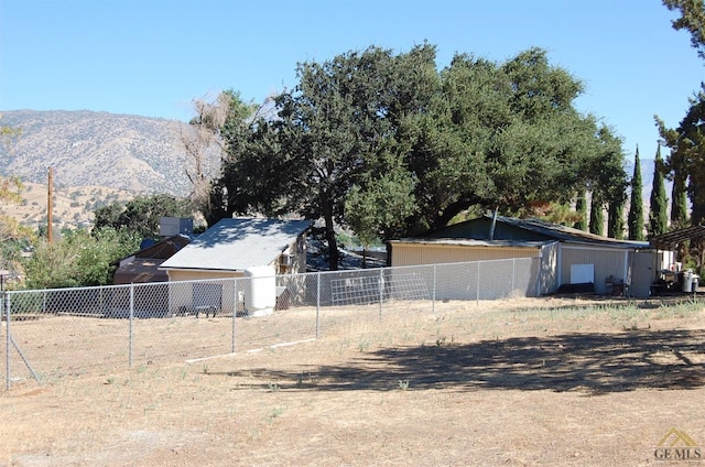 view of side of property featuring a mountain view