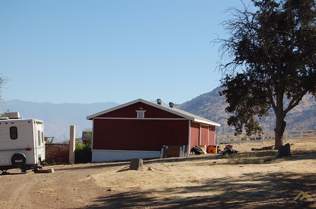 exterior space featuring a mountain view