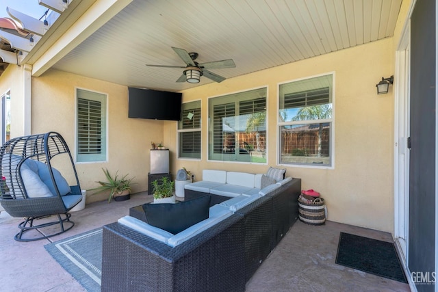 view of patio / terrace featuring ceiling fan and outdoor lounge area