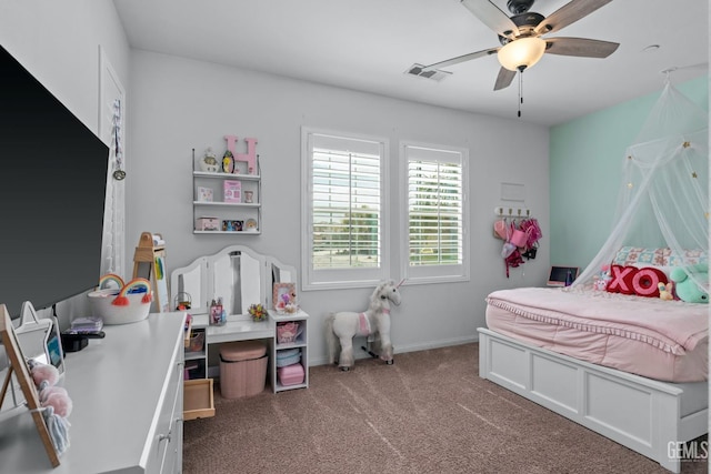 bedroom with baseboards, visible vents, a ceiling fan, and carpet