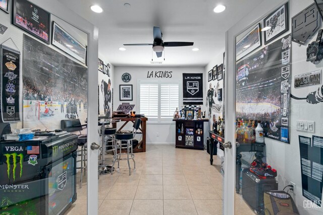 tiled home office with recessed lighting and a ceiling fan