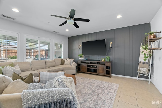 living room with tile patterned flooring, recessed lighting, visible vents, and ceiling fan