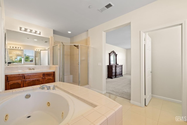 full bath with tile patterned floors, a jetted tub, visible vents, vanity, and a stall shower
